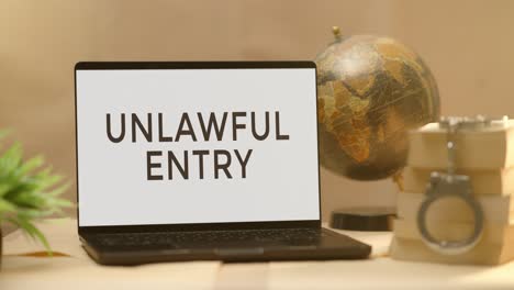 UNLAWFUL ENTRY DISPLAYED IN LEGAL LAPTOP SCREEN