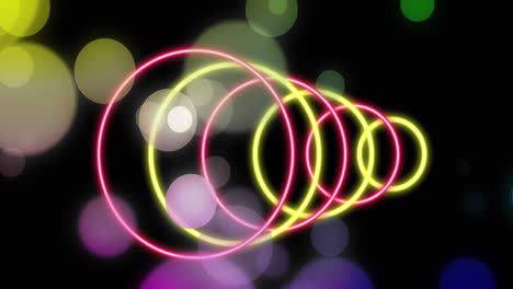 Animations-of-moving-lights-and-colorful-shapes-over-black-background