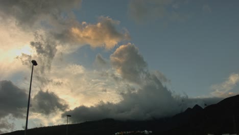 tenerife clouds over a mountain in the evening timelapse