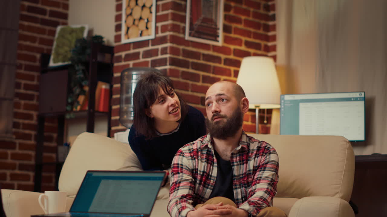 Unhappy woman having argument with husband at counseling session