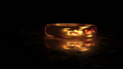 flying around the gold ring love forever on the matte glass surface with reflection