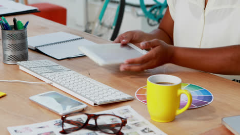 female designer using digital tablet in office 4k