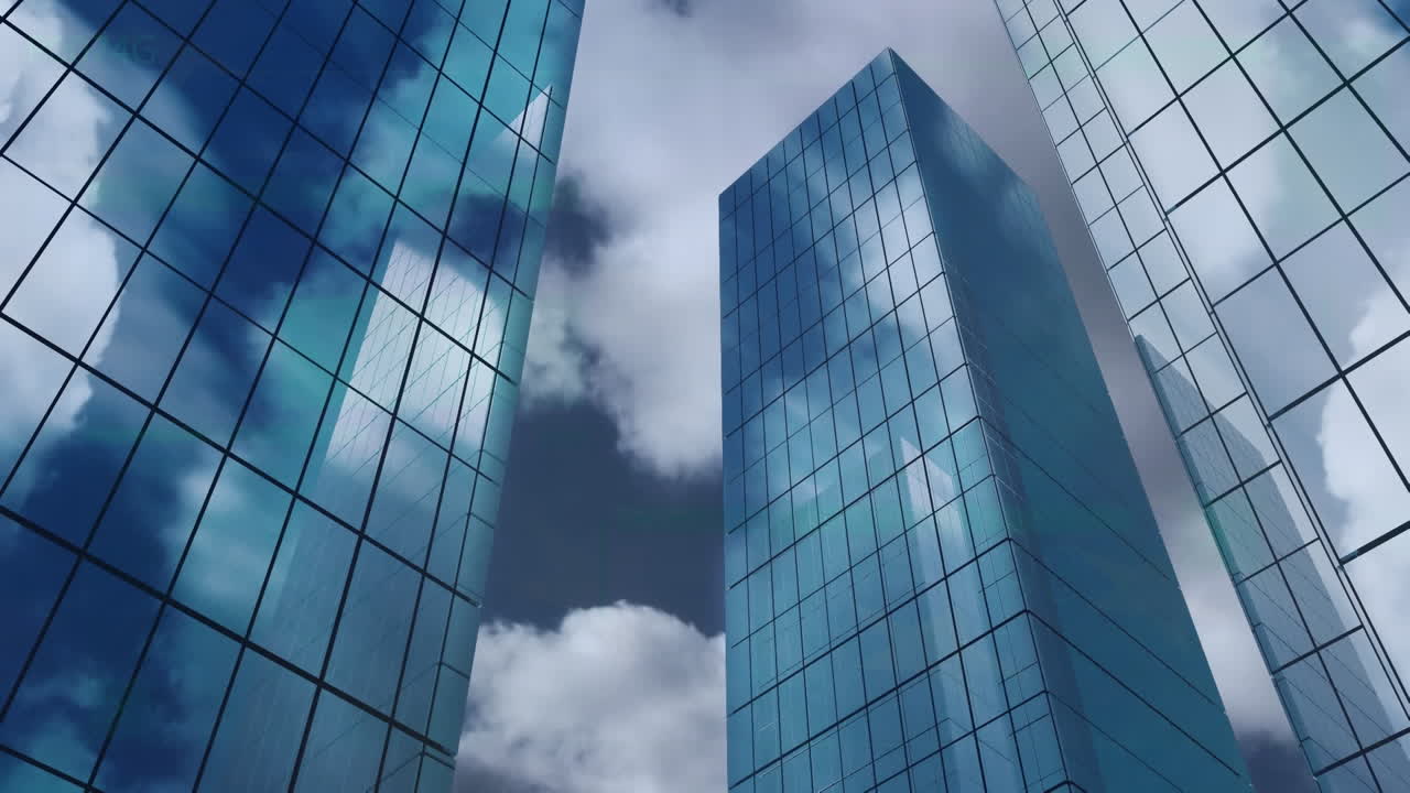 Animation of low angle view of tall buildings against clouds in the sky