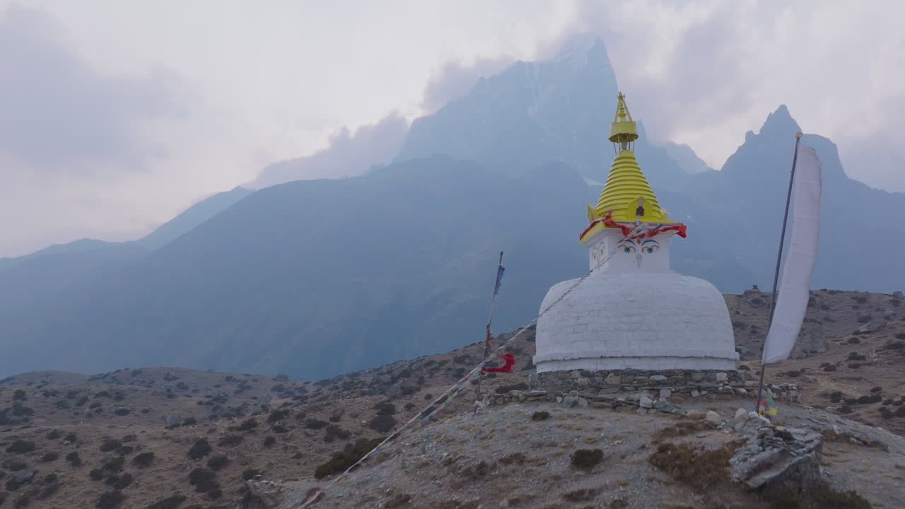 Drone shot of Buddhist Stupa at Dingboche Village 4400m, Everest Base Camp trek. Serene Himalayan landscape, Sherpa culture, spiritual calm and peaceful environment Nepal