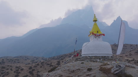 drone shot of buddhist stupa at dingboche village 4400m, everest base camp trek. serene himalayan landscape, sherpa culture, spiritual calm and peaceful environment nepal