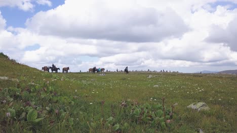 horseback riding adventure in mountainous landscape