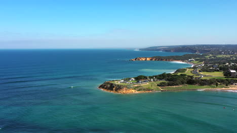 aerial around point danger, torquay australia on a sunny day