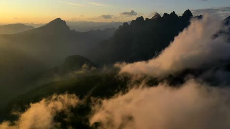 clouds forming in the dolomites in italy at sunset, aerial hyperlapse