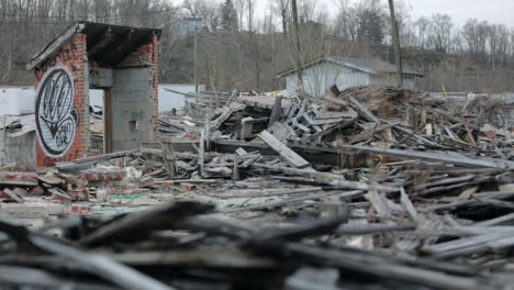 close up of wood and rubble from a destroyed building.