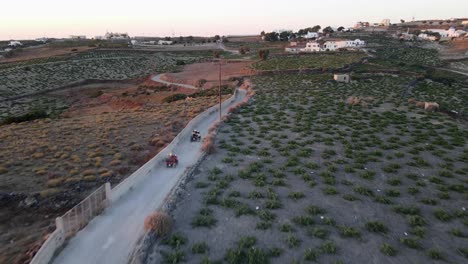 Driving-quad-bikes-in-Santorini-captured-by-drone-in-4K