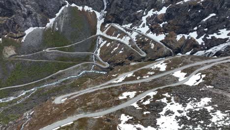 trollstigen road winding up mountain pass in norway