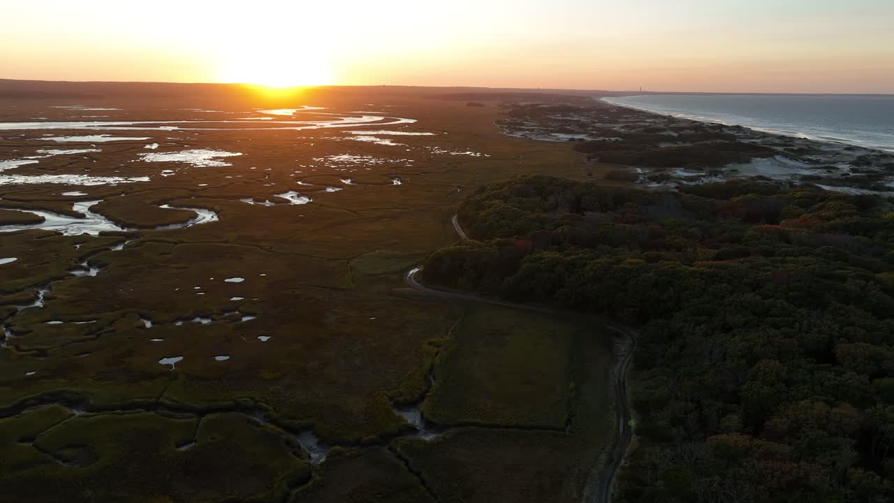 Salt Marsh At Sunset In Cape Cod, Barnstable, Massachusetts - Aerial Drone Shot