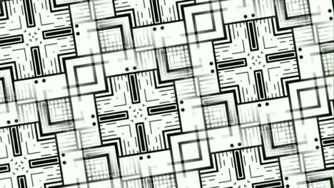 monochromatic patterns and designs on revolving solid sheet of wallpaper