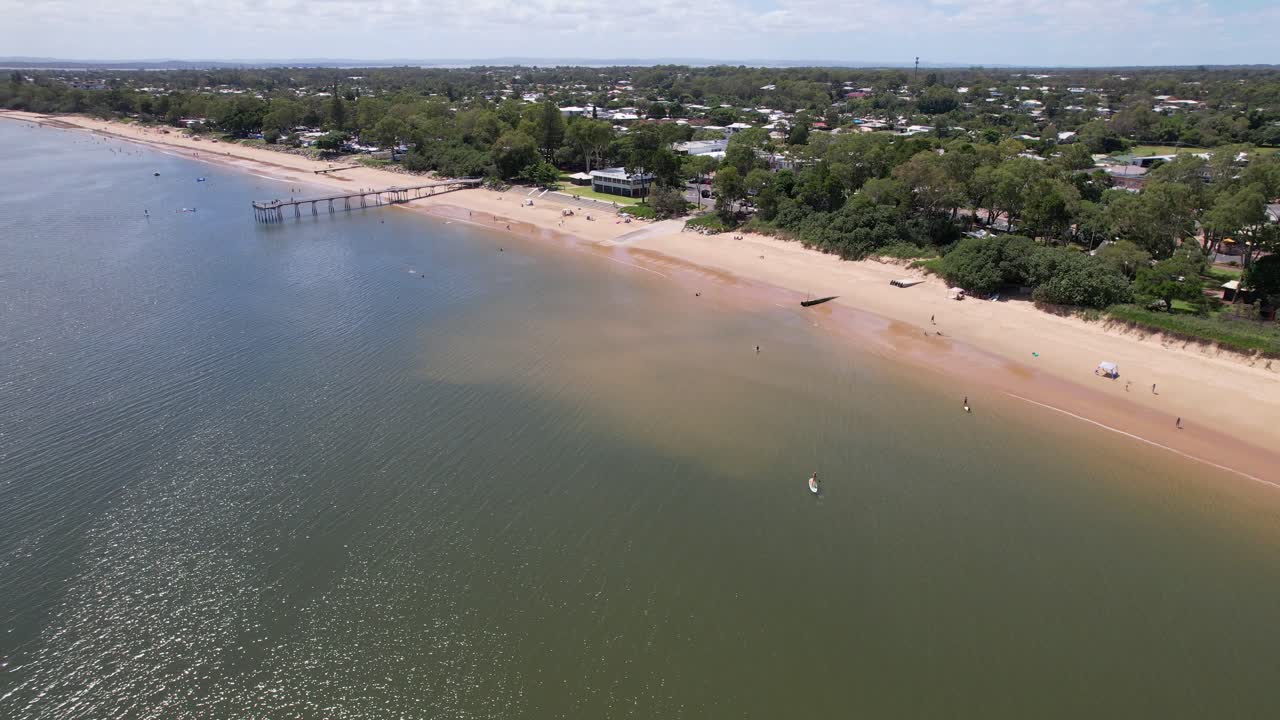 Aerial view of the lush greenery at Nielsens Park in Hervey Bay, Australia, with clear skies