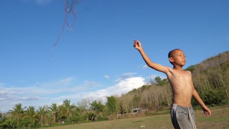 boy flying a kite