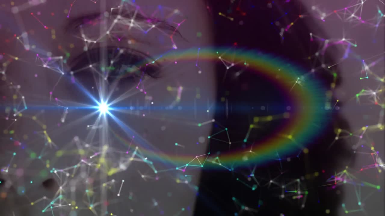 Animation of glowing spot and network of connections over woman's face