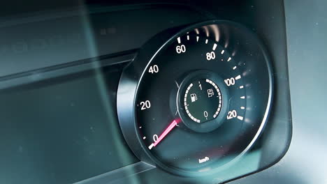 car dashboard with speedometer and fuel gauge