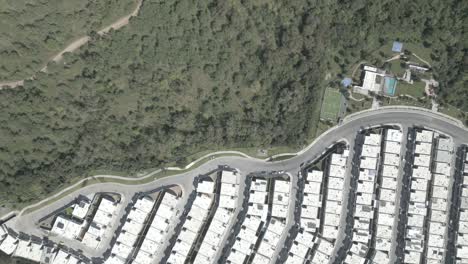 aerial view of a modern residential community with solar panels