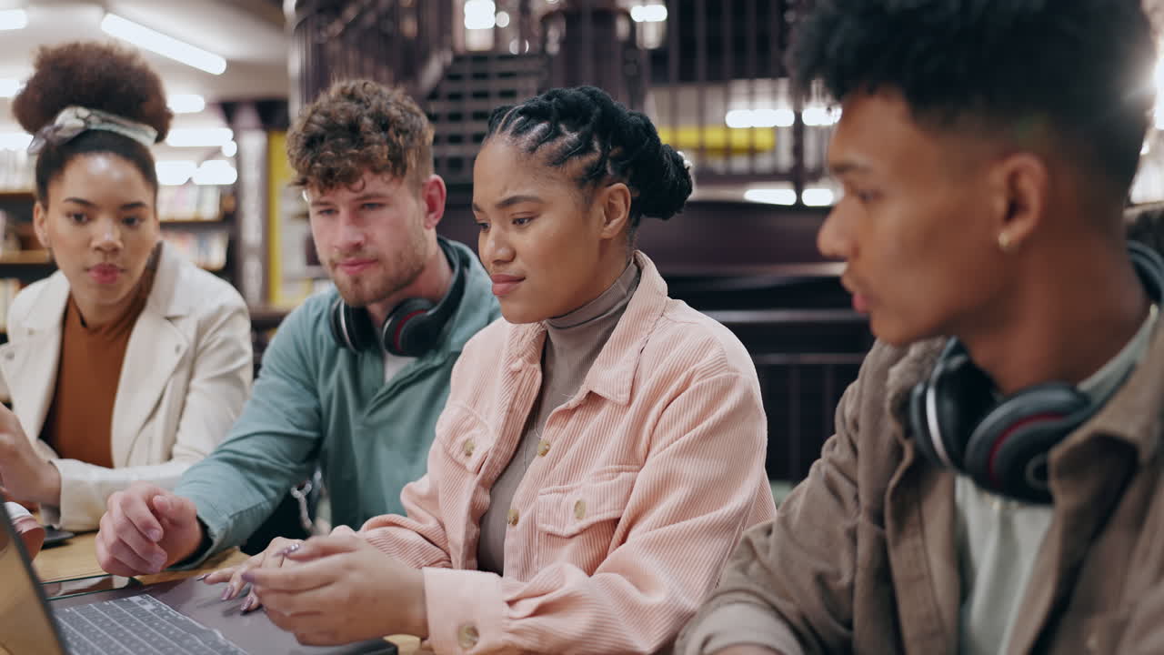 Students collaborating in a library