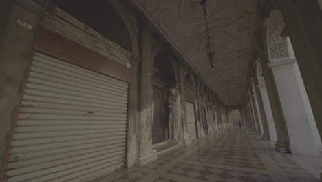 venice arcade with statues