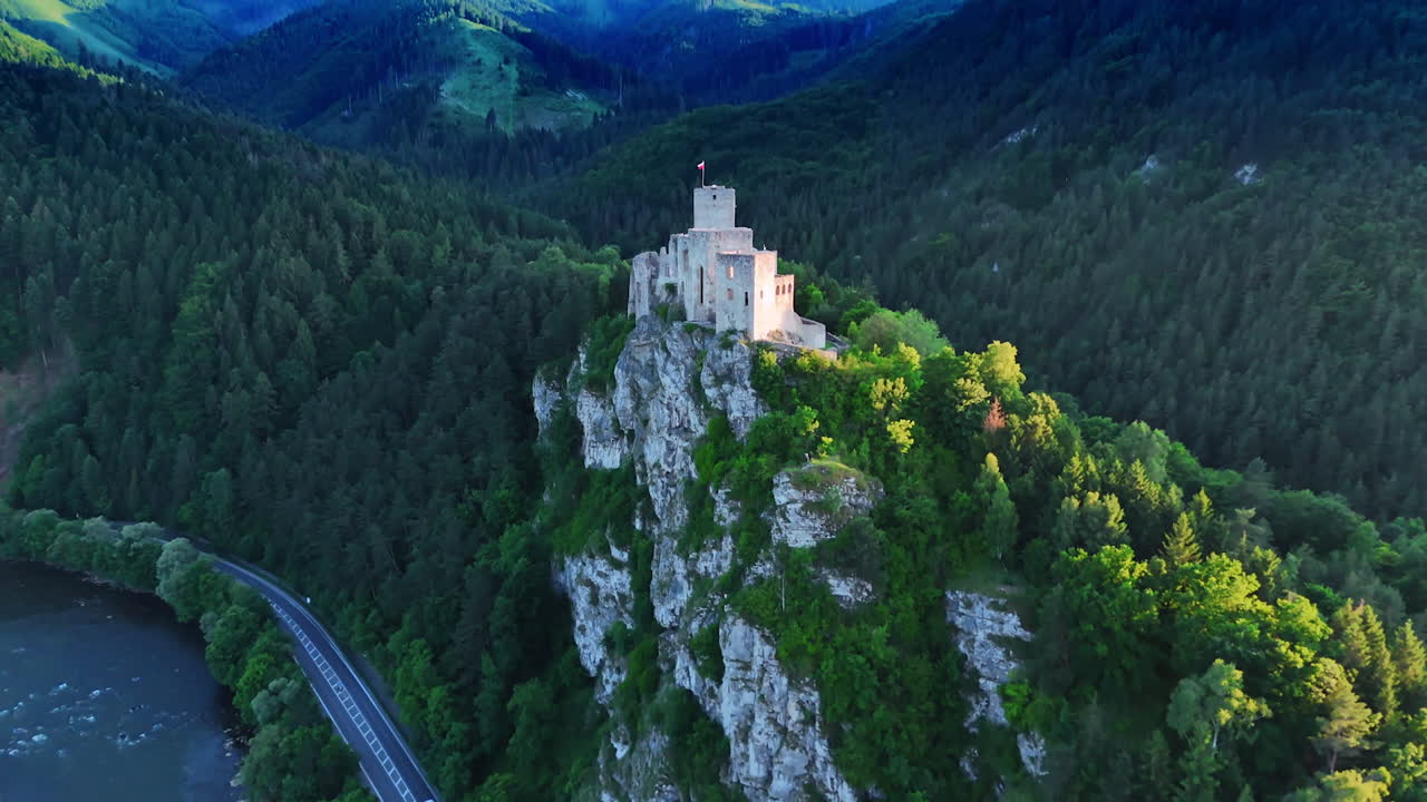 Approaching the Strecno Castle on the mountain top. Slovakian landmark from drone footage