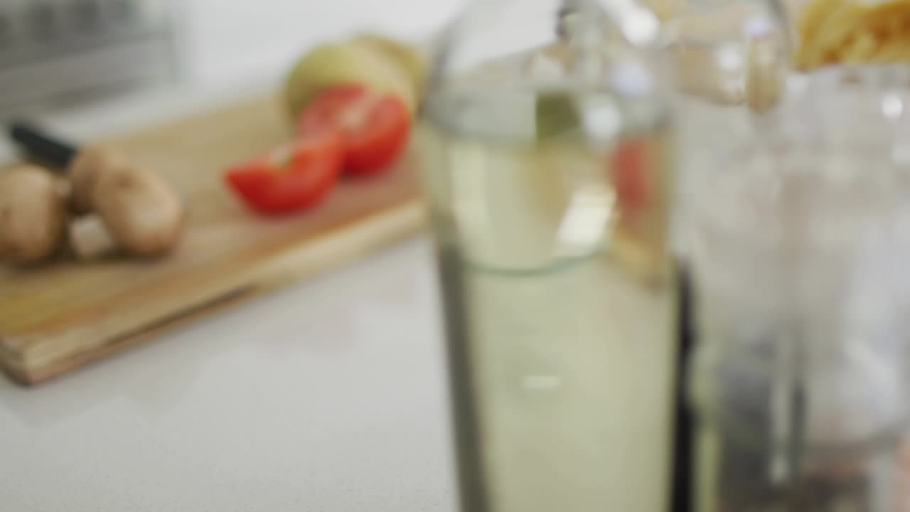 Close-up showing tomatoes mushrooms garlic on board as map expanding highlighting global cuisine