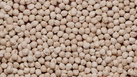 group of raw chickpeas rotating in а circle