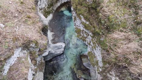 beautiful view of turquoise water going down the river at soca river, slovenia