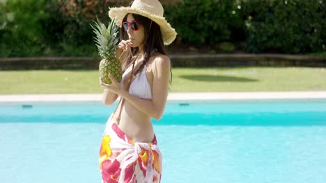 Woman-in-straw-hat-and-colorful-wrap-skirt