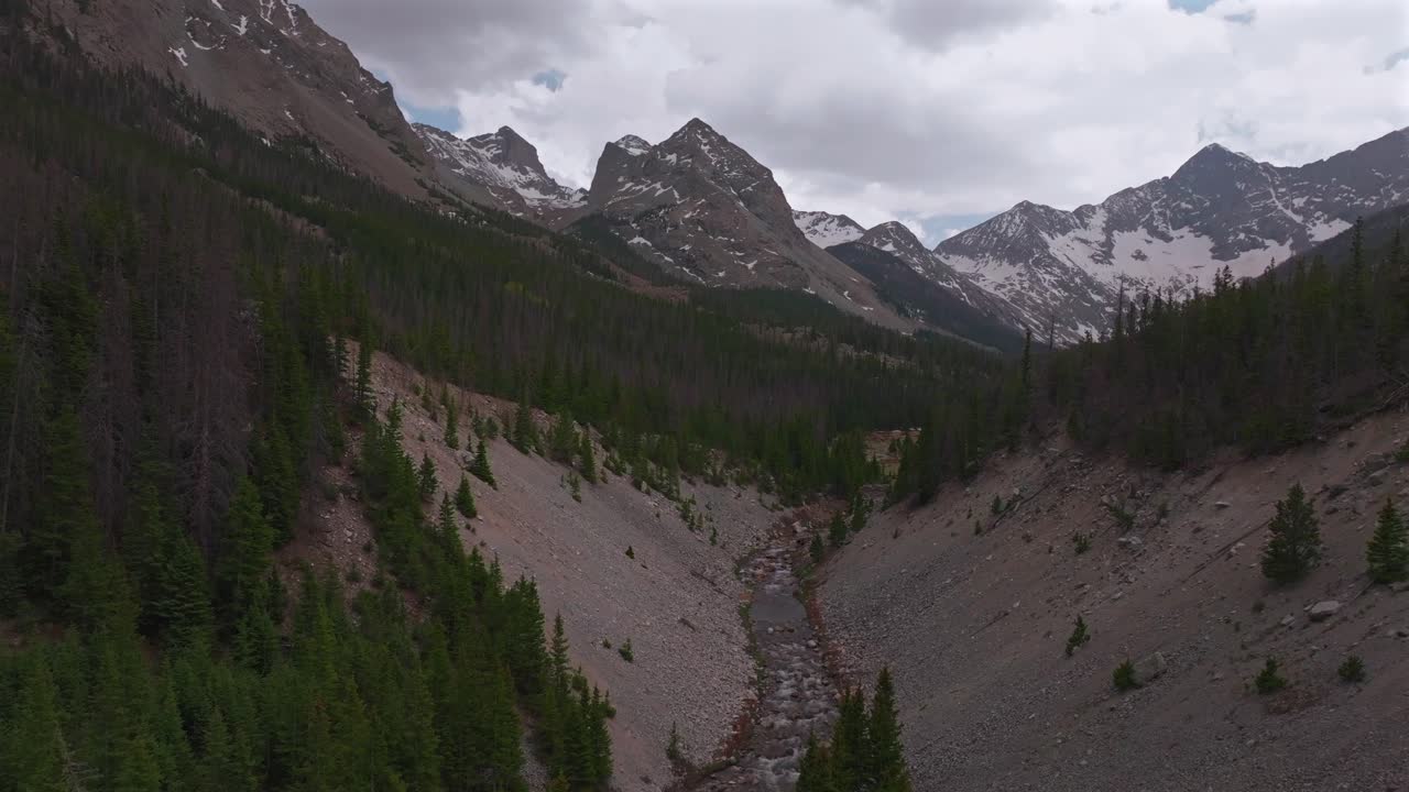 Huerfano River valley Blanca Peak Mt Mount Lindsey Lily Lake trail Sangre de Cristo Range Colorado aerial drone spring Summer San Isabel forest Iron Nip ple Rocky Mountains snow melt gray clouds up