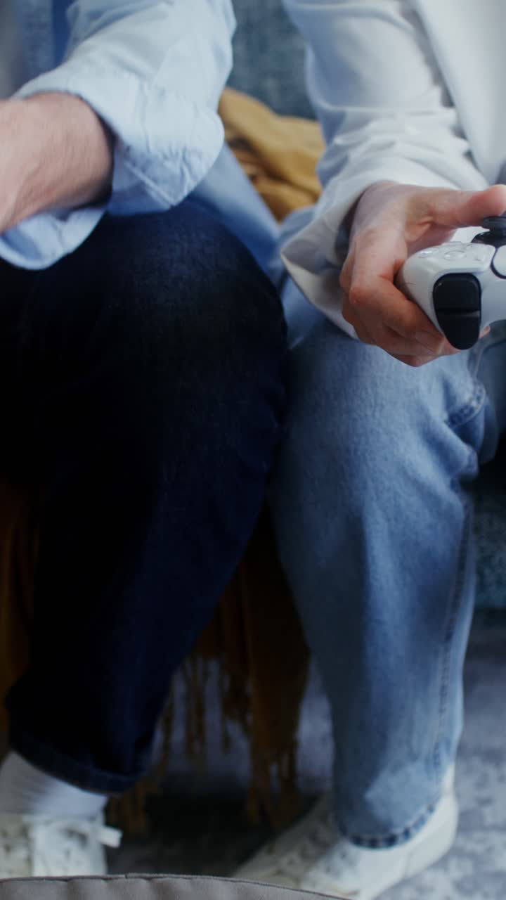 Couple playing video games together