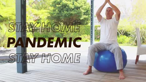 Animation-of-words-Stay-At-Home-Pandemic-over-a-Caucasian-man-stretching-on-a-Swiss-ball