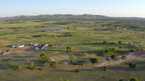 Static-aerial-of-nomadic-ranch-farmers-on-xilinguole-grasslands-Mongolia,-panoramic-overview