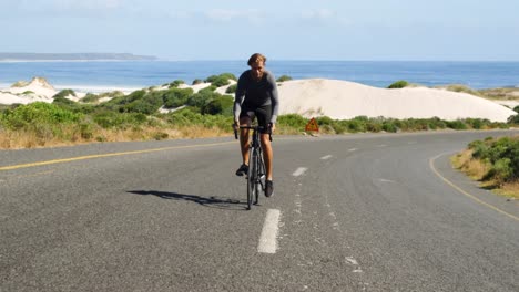 triathlete man cycling on a sunny day
