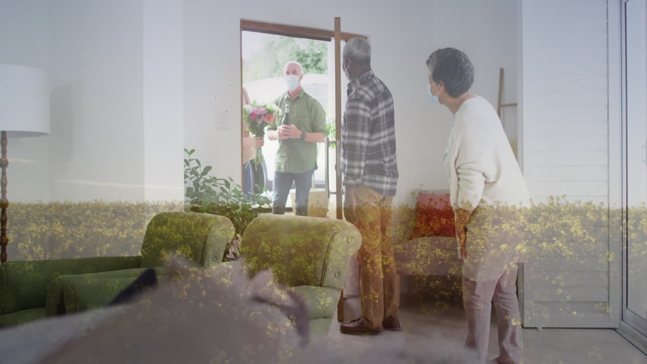 Welcoming visitors, elderly couple holding flowers with blooming animation overlay