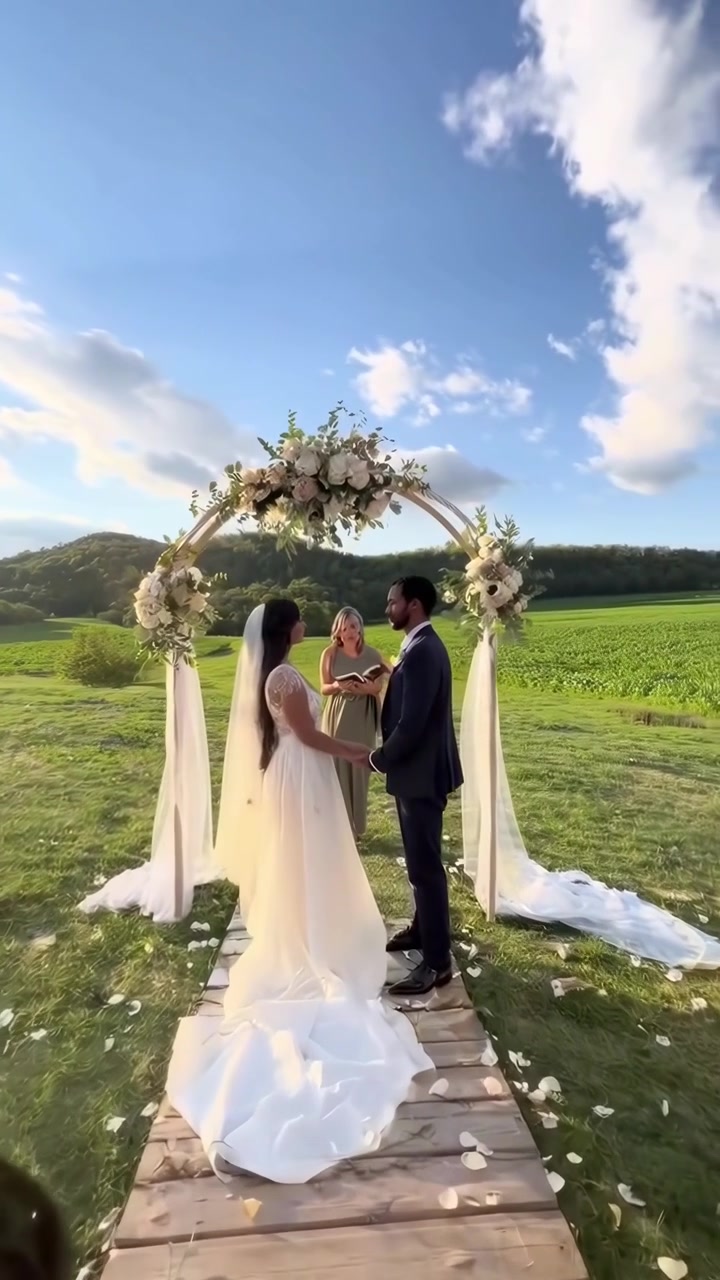 Bride and Groom Exchanging Vows at Outdoor Wedding Ceremony