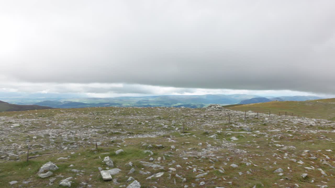 Slow panning shot of the views of the Scottish Highlands from Ben Chonzie