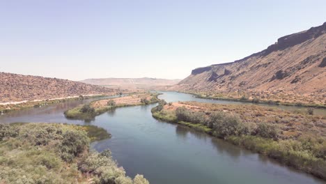 the mighty snake river in idaho that meanders across the landscape and creates natural islands that feed all manner of birds and animals