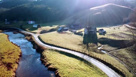 aerial push in over the watauga river to farm near boone and blowing rock nc, north carolina