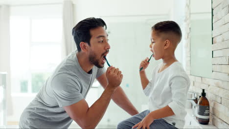 Vater,-Junge-Und-Zähneputzen-Im-Badezimmer