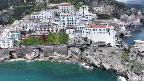 amalfi coast at amalfi in salerno italy. coastal city. waterfront landscape. amalfi coast at salerno italy. beach scenery. medieval buildings. amalfi coast skyline. beach landscape.