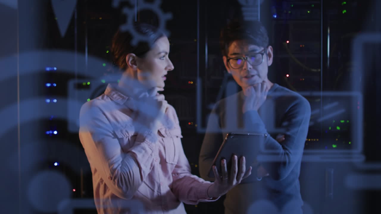 Animation of data processing, diverse male and female it engineers with tablet by computer servers