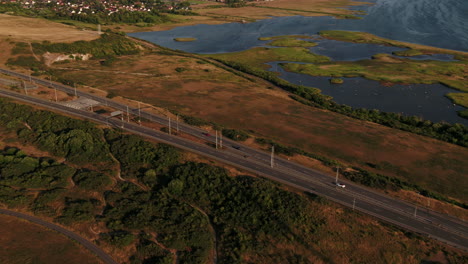 4k drone footage of cars leaving the öresundsbro in southern sweden