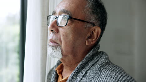 senior man, thinking and memory by window