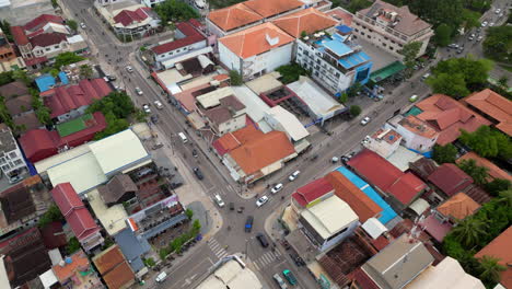 traffic navigates busy four way intersection in central siem reap cambodia