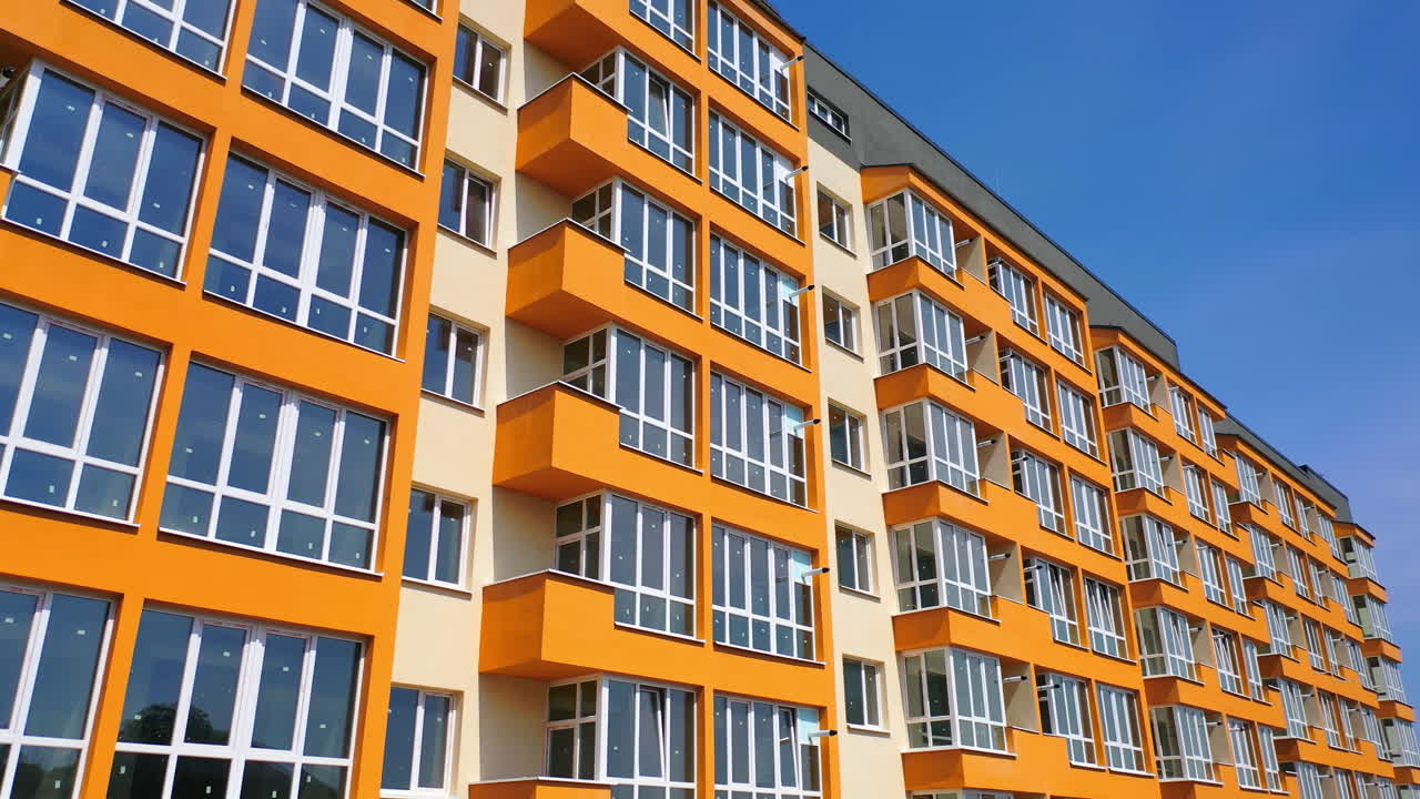 Orange and Beige Apartment Building Facade