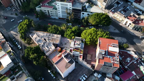 mexico city aerial drone at magic hour, skyline tilt down into birds eye