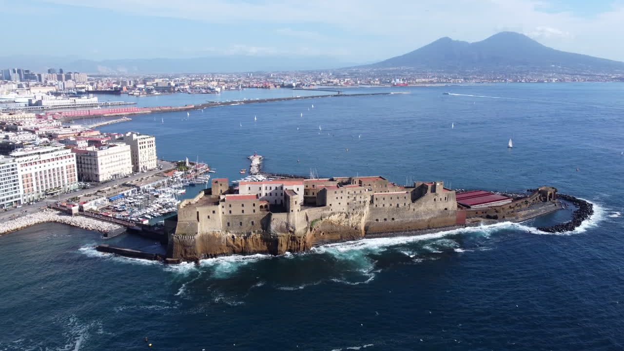 Castel dell'Ovo Seafront Egg Castle, Naples with Mount Vesuvius AERIAL
