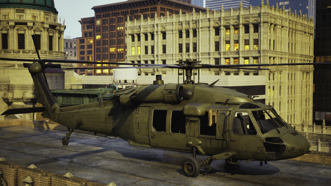 Military helicopter on urban rooftop during sunset with city skyline backdrop