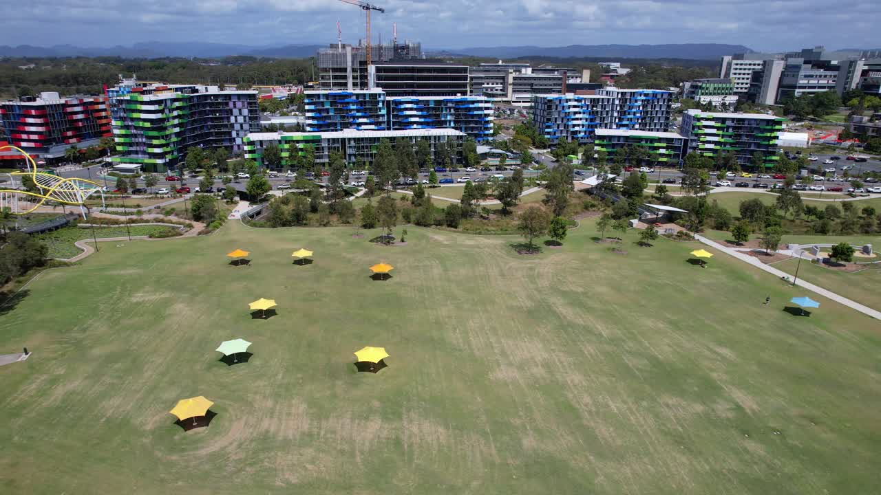 Village Heart Park And Smith Collective Apartment Buildings In Southport, Queensland, Australia. Aerial Shot